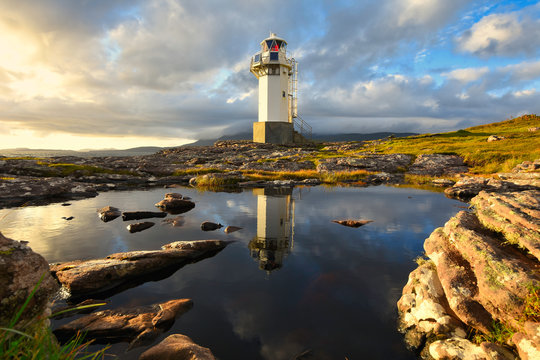 View of Rhue Lighthouse at sunset near Ullapool, North west scotland.