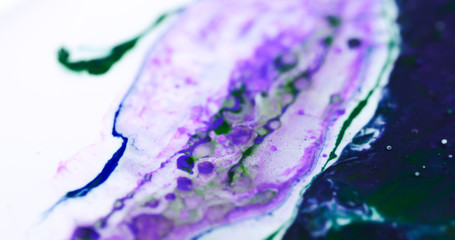 Closeup Paint with Vibrant Color Palette. Oil Mixed with Bright Purple and Green Dye and Paint.