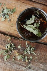 Useful tea with herbs on the table