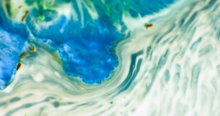 Macro Paint with Vibrant Color Palette. Oil Mixed with Bright Blue and Green Dye and Paint.