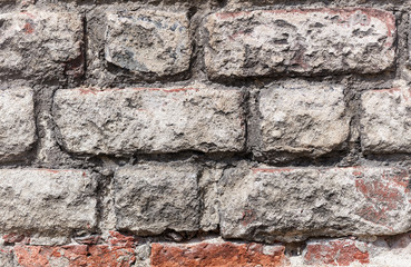 Background of old brick wall. Soft focus. Front view.