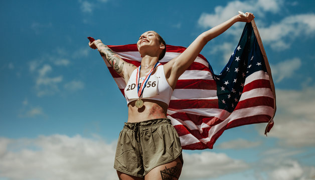 Athlete Enjoying Victory With US National Flag