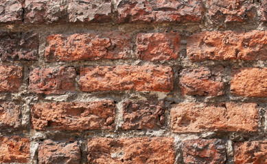 Background of old brick wall. Soft focus. Front view.