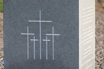 German military cemetery in autumn with mountains in the background and many graves of soldiers killed in the Second World War. Sunny day, Slovakia, Europe.