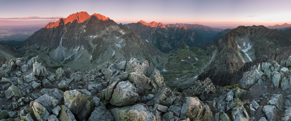 Obraz premium Sunset in High Tatras mountains national park in Slovakia. Scenic image of mountains. The sunrise over Carpathian mountains. Wonderful landscape. Picturesque view of nature. Amazing natural Background