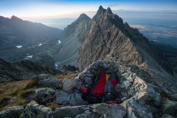 Summer bivi or bivouac in mountain alpine like landscape of High Tatras, Slovakia. Sunrise or sunset on the summit of peak.
million star hotel under night sky on pass in Alps. Beautiful nature 