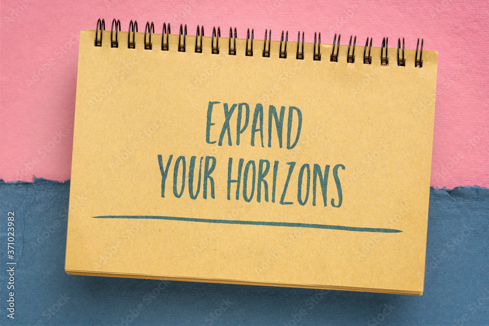 Poster expand your horizons inspirational note - handwriting in a sketchbook, business, education and perso