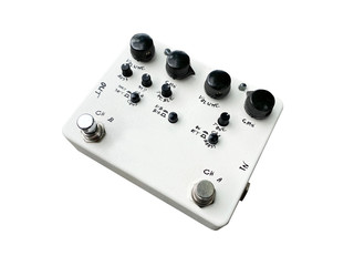 Isolated white overdrive dual-channel stompbox electric guitar effect for studio and stage performed on white background with clipping path. music concept.
