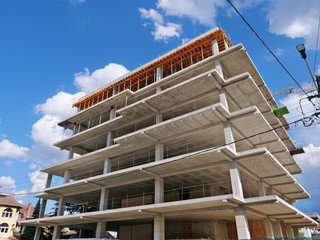 Concrete frame structure of a new multi-story apartment building in construction