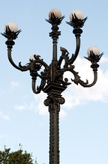 The street lamppost with birds in Athens in Greece