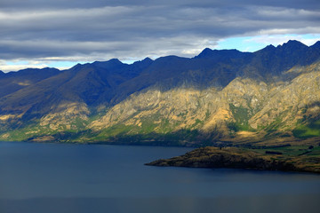 Fototapeta na wymiar Mountain lake clouds and view of New Zealand in spring season