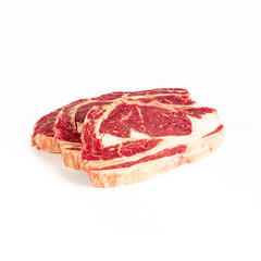 Matured beef chops, two fillets , photograph taken on pure white background, for e-commerce. front view