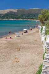 Fototapeta na wymiar Picturesque golden sandy beach in Kalamaki situated on Laganas bay of Zakynthos island on Ionian Sea, Greece.