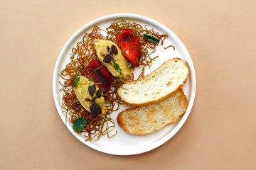 Classic hummus in the dish with bread