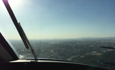 View from the control cabin of an airplane descending for landing