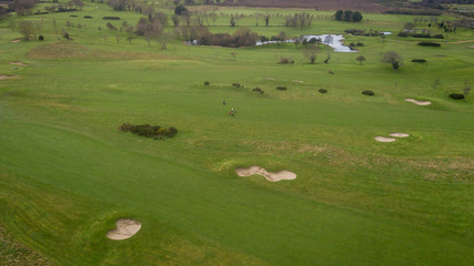 Aerial View of Golf Course with Lake and Bunkers, Ireland