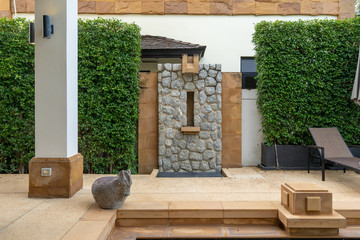 Exterior design of house, home and villa feature outdoor shower on pool terrace and green tree