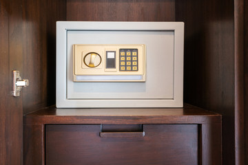 Safety box with electronic password in wooden wardrobe