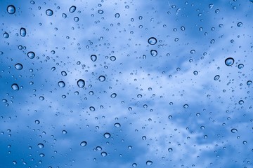 Rain drop with blue sky background
