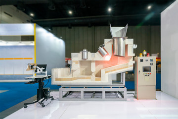 cross section of high temperature quick & hold melting furnace for aluminum or alloy of manufacture casting process and cabinet electric control panel