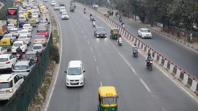 New Delhi, India - January 06, 2020: smooth traffic on lane, vehicle passing by road smoothly