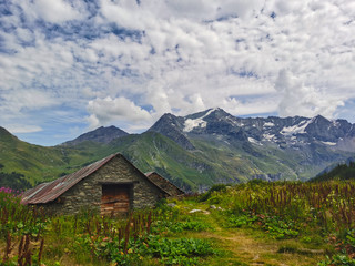 Fototapeta na wymiar Alpine pasture chalet in high mountain, french alps.