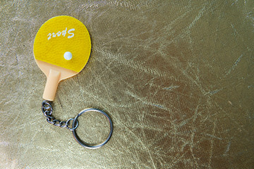 female hand holding a tennis ball