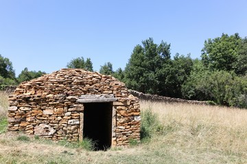 Old and typical stone hut called caborne in french language in Saint Cyr au Mont d'or, France