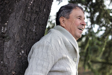 Portrait of happy senior man. Portrait of elderly man enjoying retirement