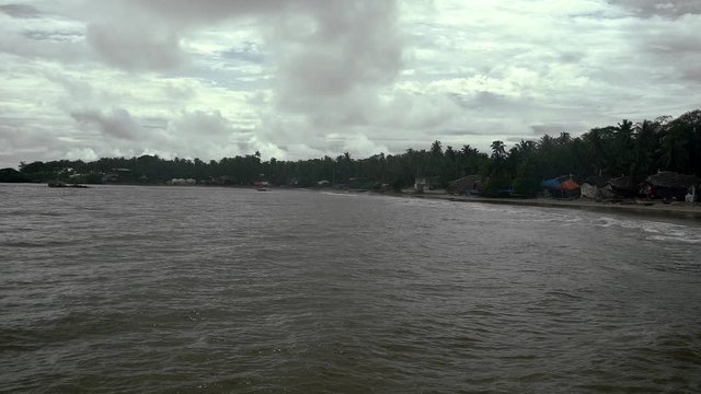 malvan beach and sea in rain