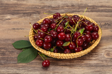 Sweet ripe cherry with leaves