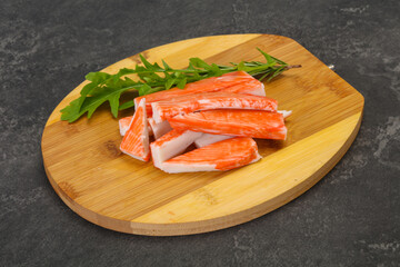 Crab stick surimi over board