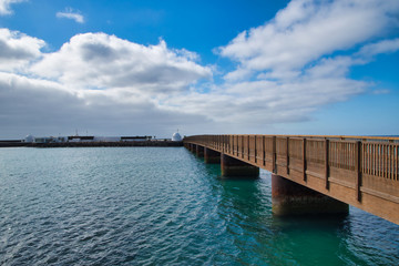 Obraz premium Bridge over the sea in Arrecife. Lanzarote. Canary Islands,Spain