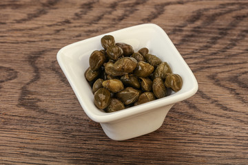Tasty capers in the bowl