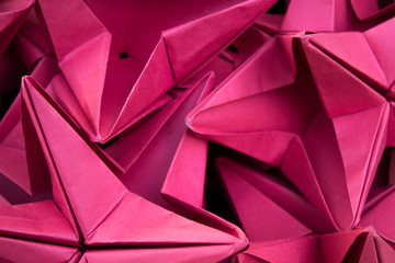origami  paper figure craft. handmade  paper flower origami background. Abstract background of the...