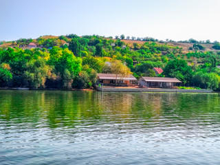 Fototapeta premium Panoramic view of fishing village on the lake