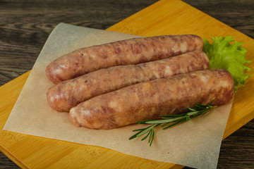 Raw pork meat sausages for grill