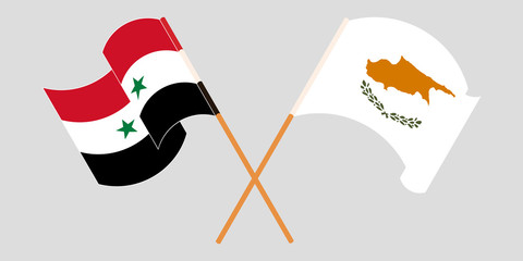 Crossed and waving flags of Syria and Cyprus