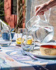 pouring a glass of water