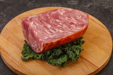 Beef ham piece over board