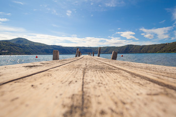 Empty pier at lake ground perspective view