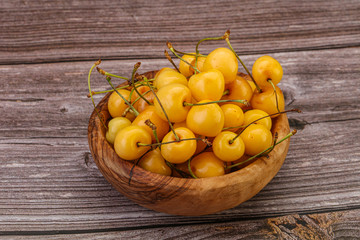 Sweet ripe yellow cherry heap
