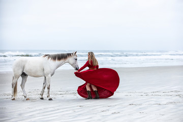 Girl and Horse On Beach