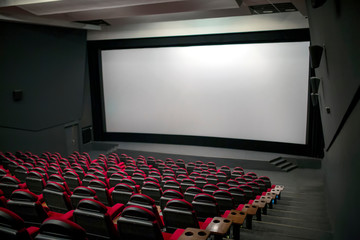 Empty cinema seats with blank white screen 08.03.2019 Brovary, Ukraine