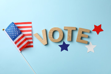 American flag, word Vote and stars on blue background