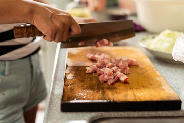 cut raw pork on wooden table