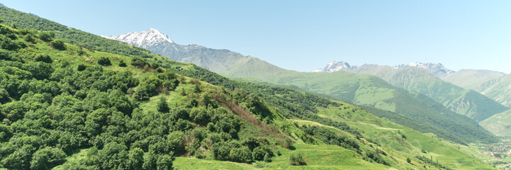 Obraz premium Highest mountain village in north ossetia in mountains with cloudy sky. Concept of travel the world