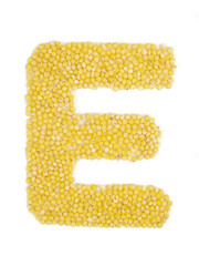 Letter E of the English alphabet made from millet on an isolated background.