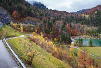 Alpine Isar river view from Sylvenstein Stausee damm , Bavaria, Germany. Autumn overcast, foggy and...
