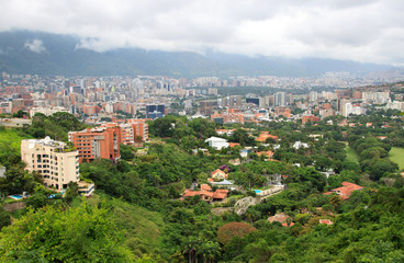 Fototapeta na wymiar CARACAS, VENEZUELA - JULY 5, 2016: Skyline of residential and commercial buildings. 